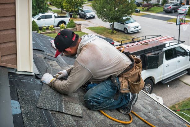 Professional Emergency Roof Repair technician working in Lesage, WV